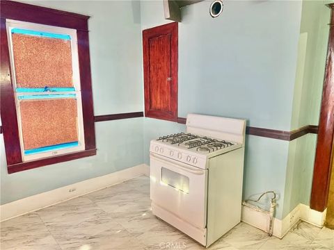 Tiny photo for 860 W 54th St, Los Angeles, CA 90037 (MLS # WS25266448)