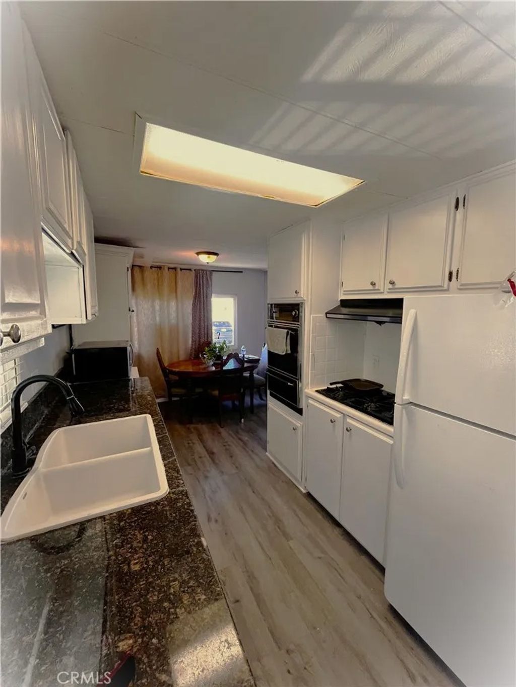 Photo of 9391 California Ave #7, Riverside, CA 92503 (MLS # IV26036602)