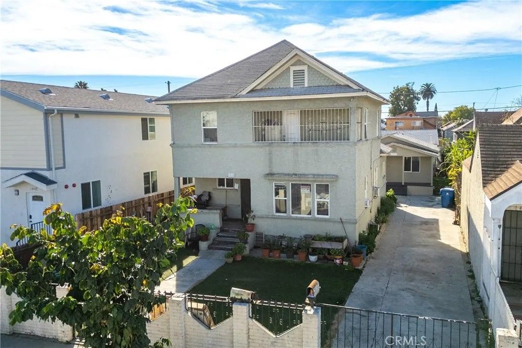 Photo of 1438 E 20th Street, Los Angeles, CA 90011 (MLS # DW26077045)
