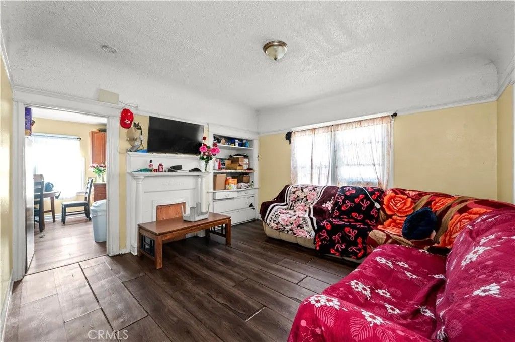 Photo of 1438 E 20th Street, Los Angeles, CA 90011 (MLS # DW26077045)