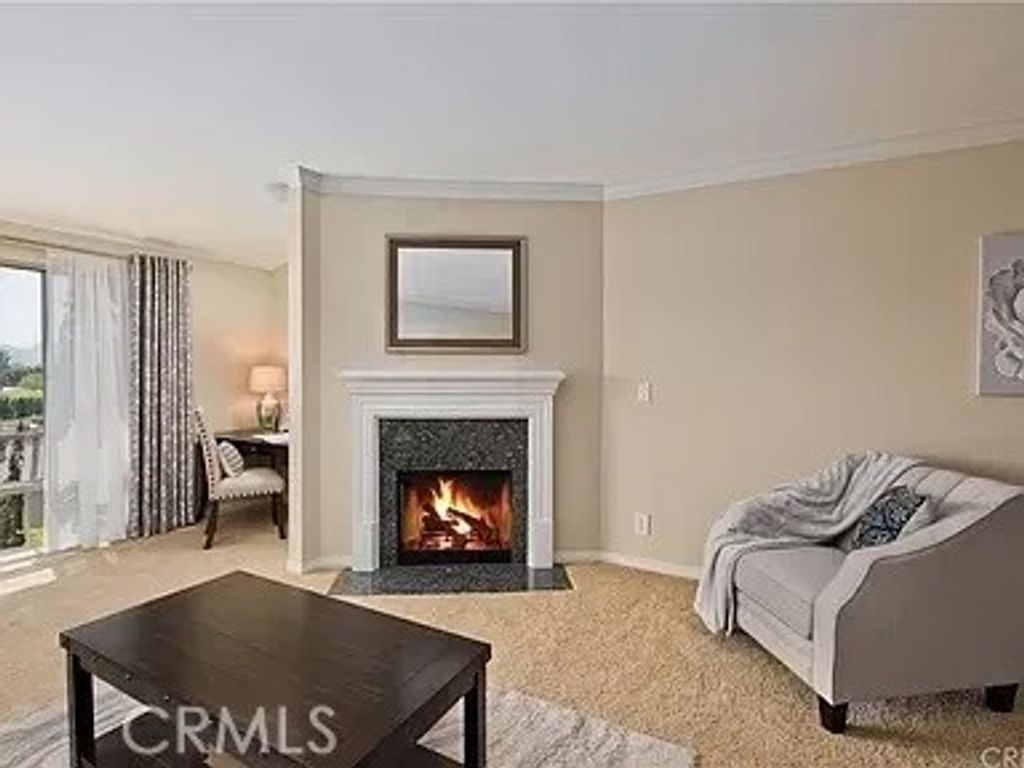 Photo of 12830 Burbank Boulevard #305, Valley Village, CA 91607 (MLS # SR26061081)