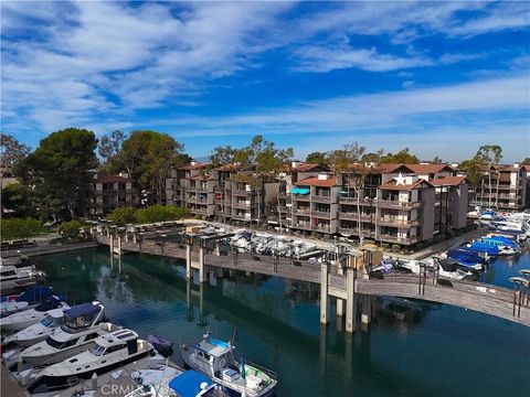 Photo of 7338 Marina Pacifica Dr, Long Beach, CA 90803 (MLS # PW26016927)