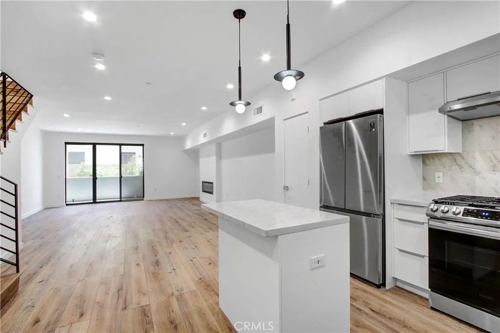 Photo of 4409 Saugus Ave #104, Sherman Oaks, CA 91404 (MLS # SR26079664)