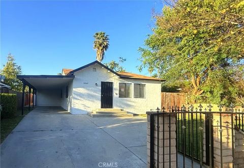 Photo of 21047 Runnymede Street, Canoga Park, CA 91303 (MLS # CV26040258)