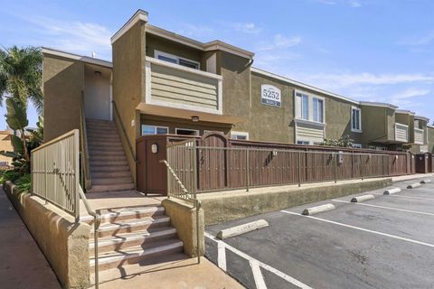 Photo of 5252 Balboa Arms Dr #120, San Diego, CA 92117 (MLS # 260004402)