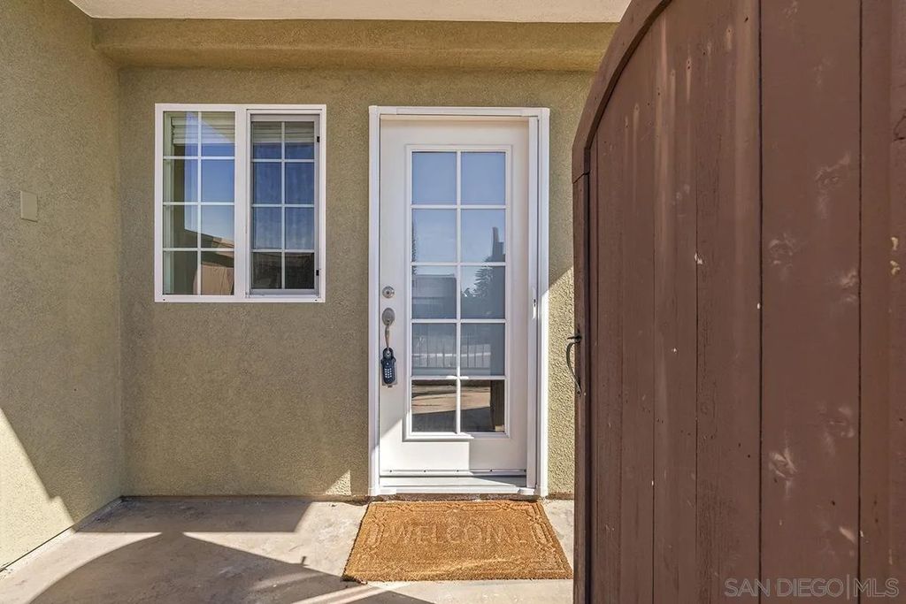 Photo of 5252 Balboa Arms Dr #120, San Diego, CA 92117 (MLS # 260004402)