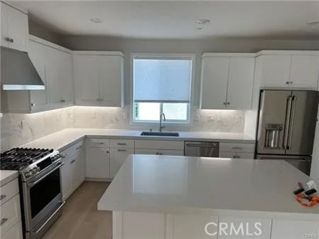 Photo of 105 Pattern, Irvine, CA 92618 (MLS # OC25269523)