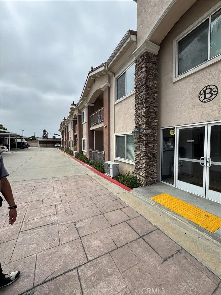 Photo of 17888 Alburtis AVE #B215, Artesia, CA 90701 (MLS # RS26122586)