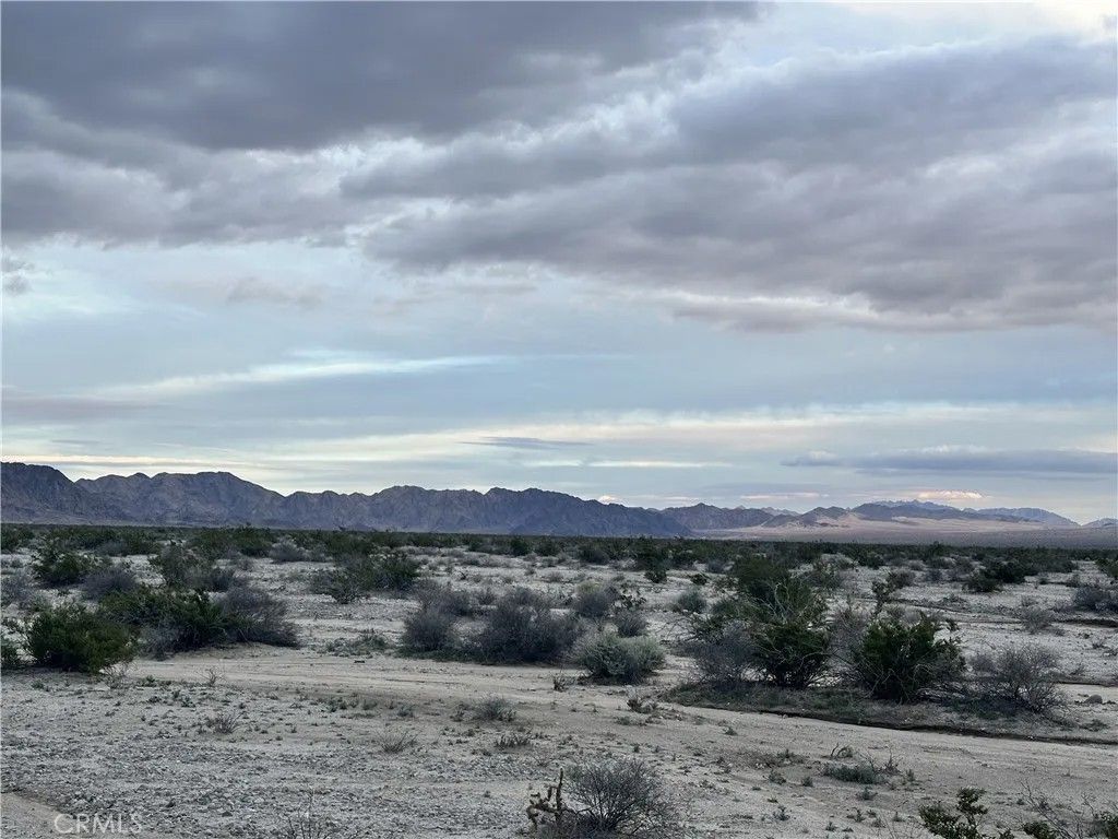Photo of 0 New Ironage Rd, 29 Palms, CA 92277 (MLS # JT25269267)
