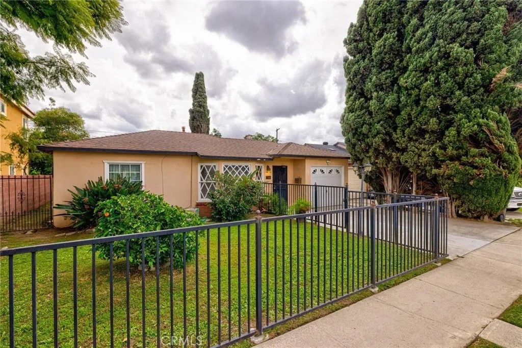 Photo of 7128 Farmland Ave, Pico Rivera, CA 90660 (MLS # PW26037660)