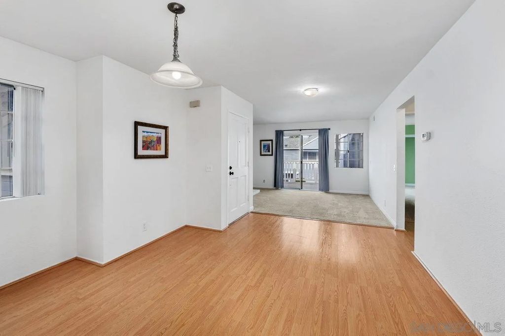 Photo of 9989 Maya Linda Rd #63, San Diego, CA 92126 (MLS # 260009870)