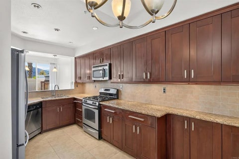 Photo of 11356 Via Rancho San Diego #E, El Cajon, CA 92019 (MLS # PTP2607869)