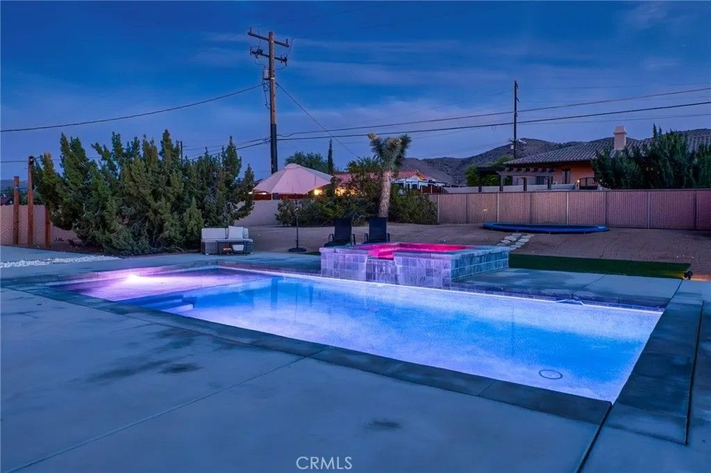 Photo of 57731 San Tropeze Dr, Yucca Valley, CA 92284 (MLS # JT26074867)