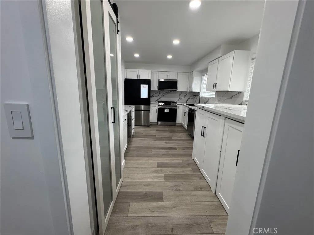 Photo of 6771 Springpark AVE #208A, Los Angeles, CA 90056 (MLS # RS26145316)