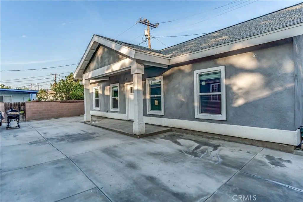 Photo of 13940 Brightwell Avenue, Paramount, CA 90723 (MLS # OC25279050)