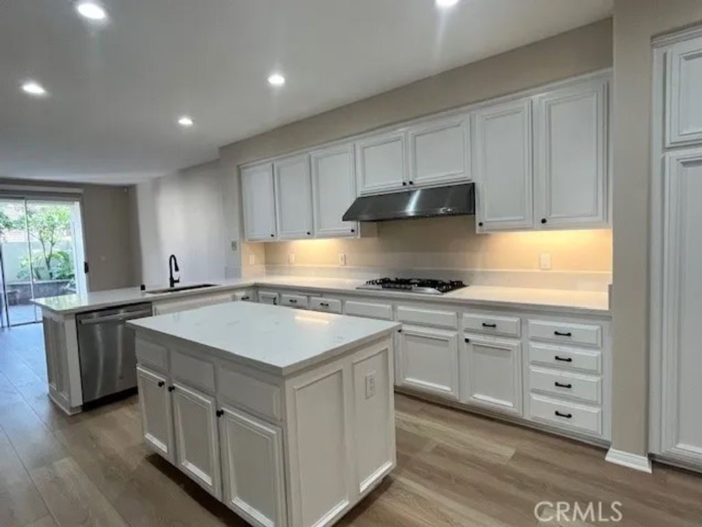 Photo of 16 Brigmore Aisle, Irvine, CA 92603 (MLS # OC26032545)