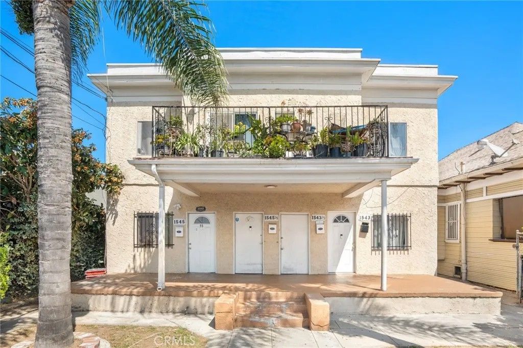 Photo of 1543 W 22nd Place, Los Angeles, CA 90007 (MLS # PW26081006)