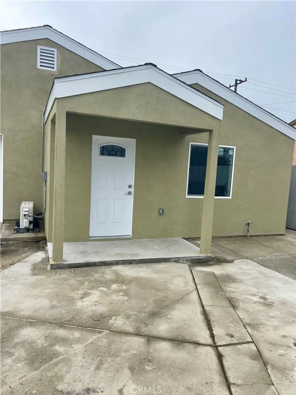 Photo of 1118 E Arlington St, Compton, CA 90221 (MLS # OC26013440)