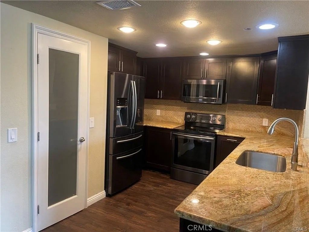 Photo of 22570 Bass Pl, Canyon Lake, CA 92587 (MLS # SW26008676)