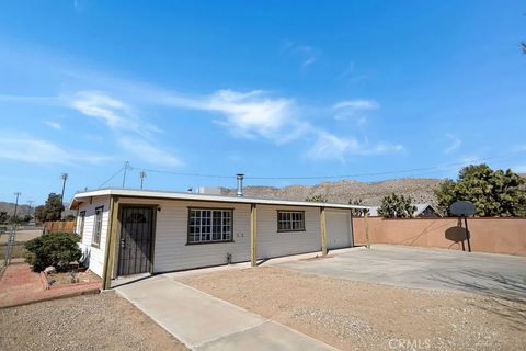 Photo of 7070 Grand Ave, Yucca Valley, CA 92284 (MLS # JT26056129)