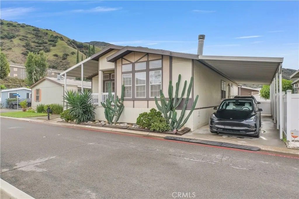 Photo of 4901 Green River #102, Corona, CA 92878 (MLS # PW25263532)