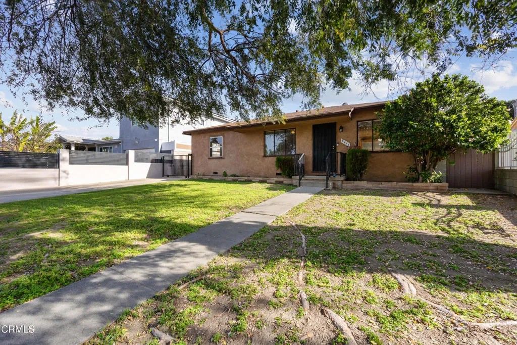 Photo of 8416 Katherine Avenue, Panorama City, CA 91402 (MLS # P1-25719)
