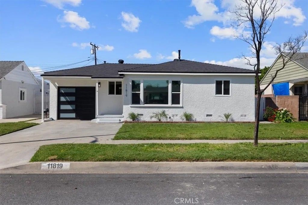 Photo of 11819 Summer Avenue, Norwalk, CA 90650 (MLS # IV26054078)