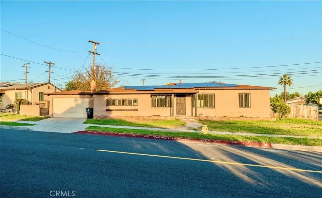 Photo of 301 E Riggin Street, Monterey Park, CA 91755 (MLS # CV26011986)