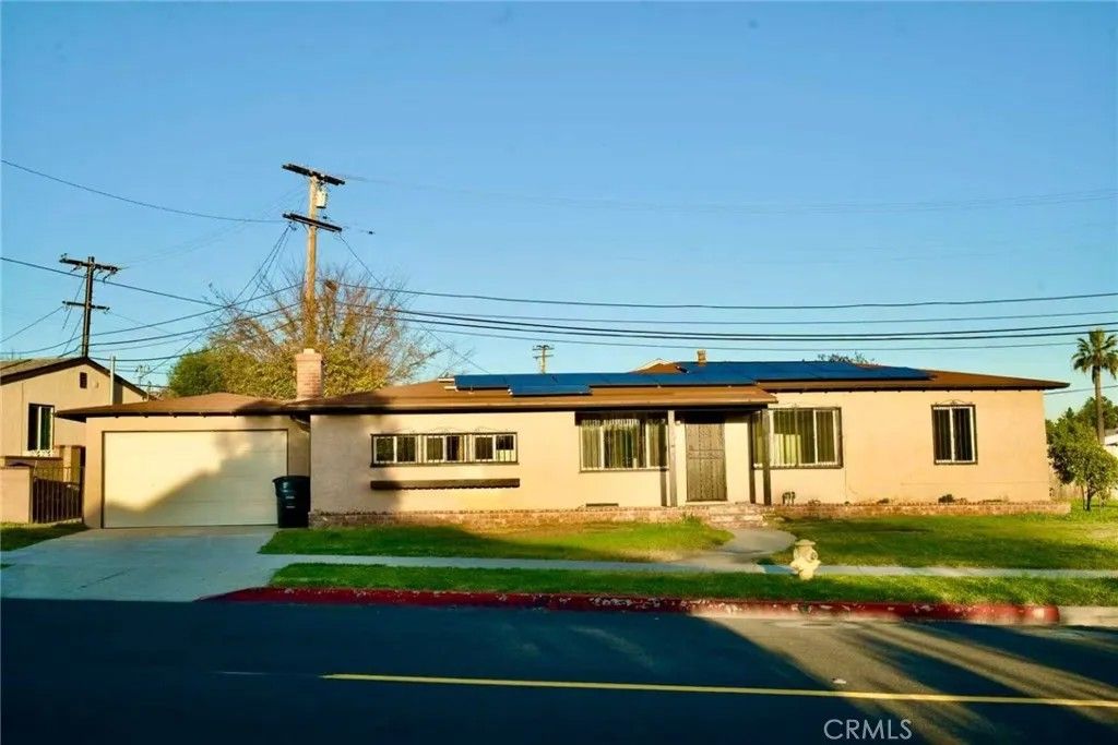 Photo of 301 E. Riggin Street, Monterey Park, CA 91755 (MLS # CV26011986)