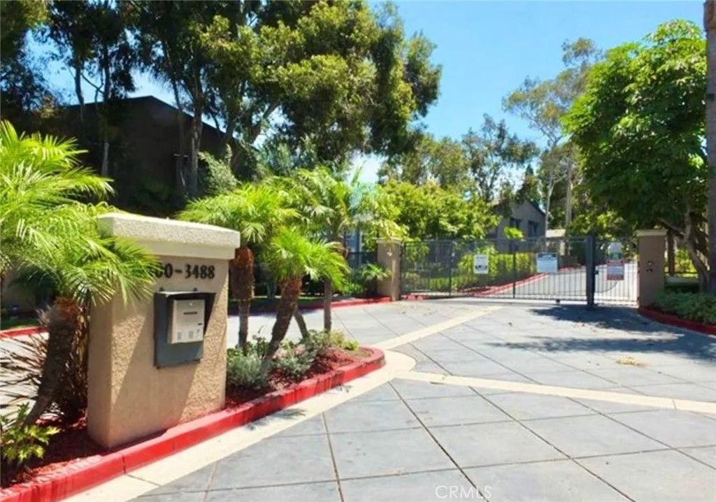 Photo of 3488 Hathaway Ave, Long Beach, CA 90815 (MLS # TR26004763)