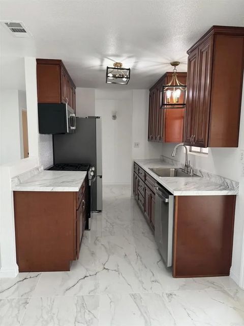 Photo of 566 Mulgrew Street, El Cajon, CA 92019 (MLS # PTP2601905)