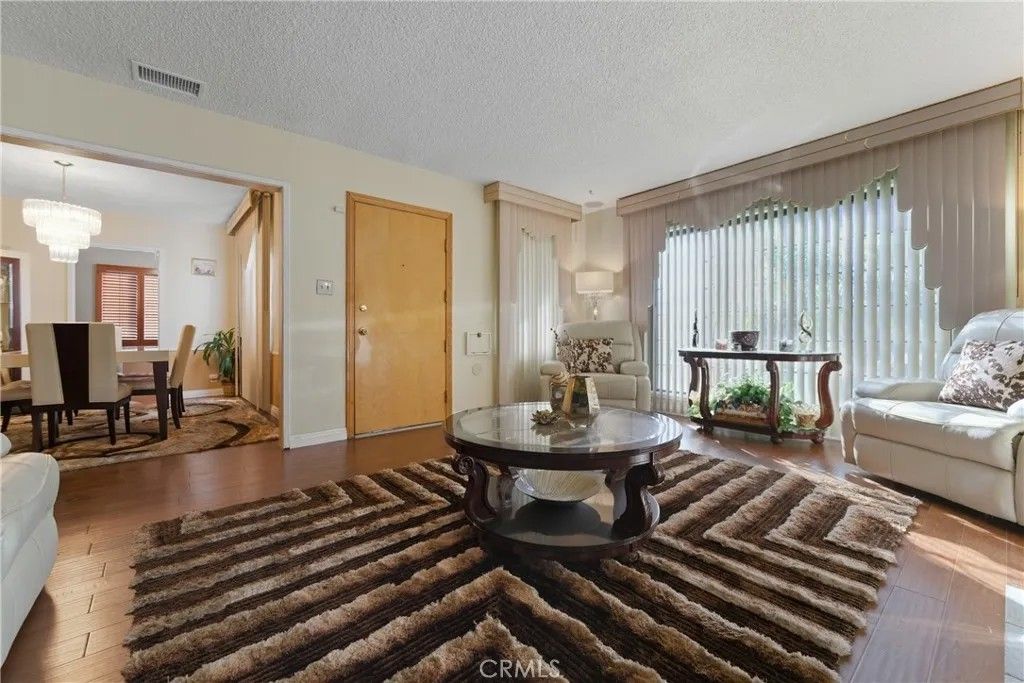 Photo of 9716 S Van Ness Ave, Los Angeles, CA 90047 (MLS # DW26013802)