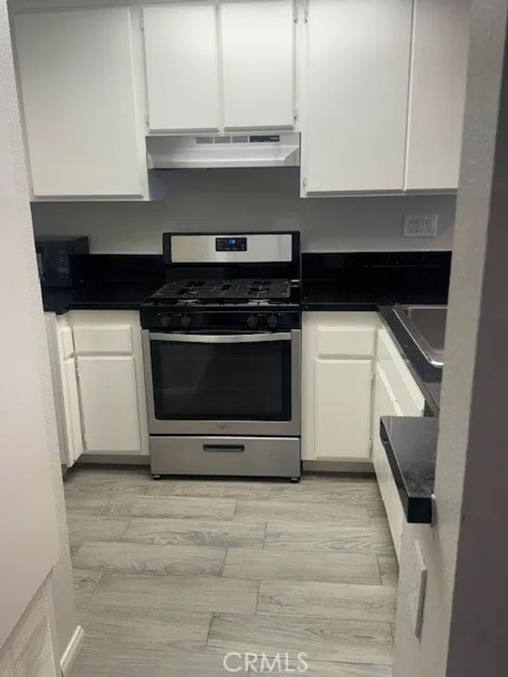 Photo of 1020 Margarita Dr #C202, Corona, CA 92879 (MLS # IG25255661)