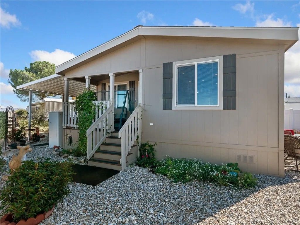 Photo of 13393 Mariposa Rd, #211 Rd, Victorville, CA 92395 (MLS # HD25266555)