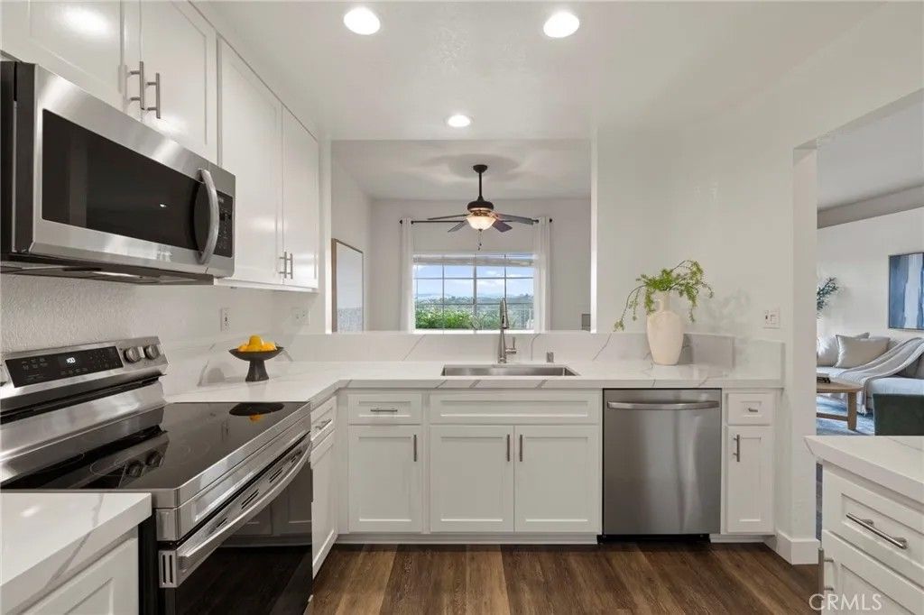 Photo of 1652 Via Ocioso, San Marcos, CA 92078 (MLS # LG26004102)