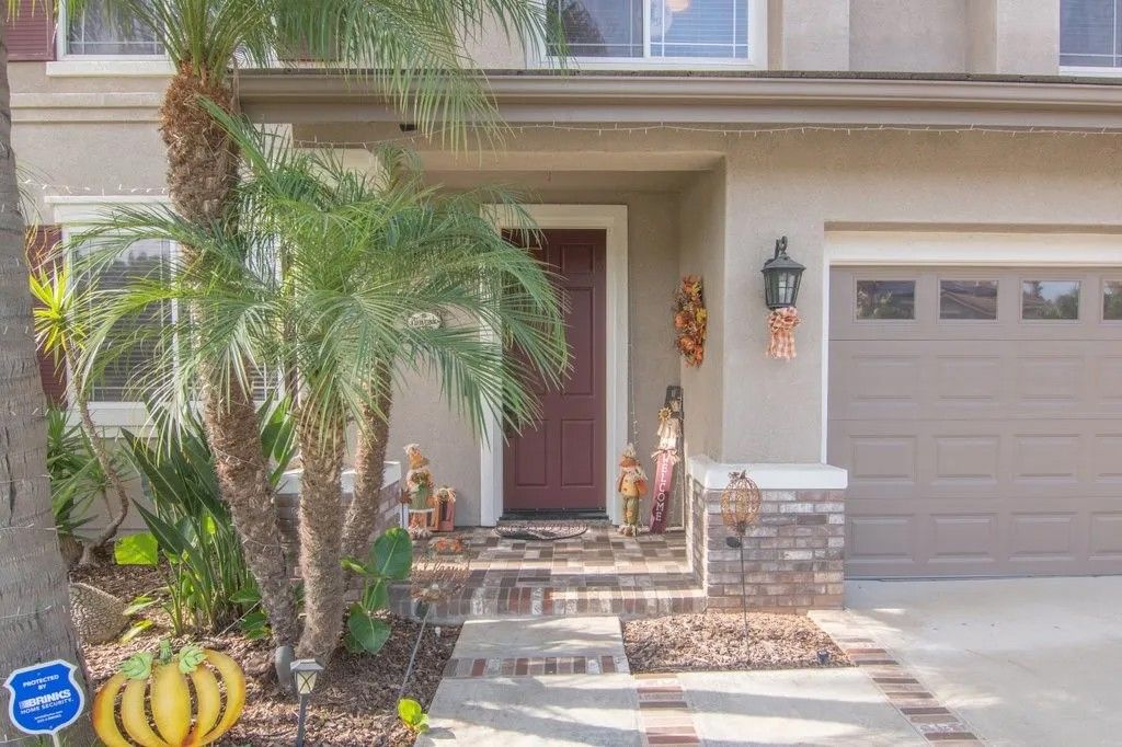 Photo of 1857 Autumn Ln, Vista, CA 92084 (MLS # SW25267356)