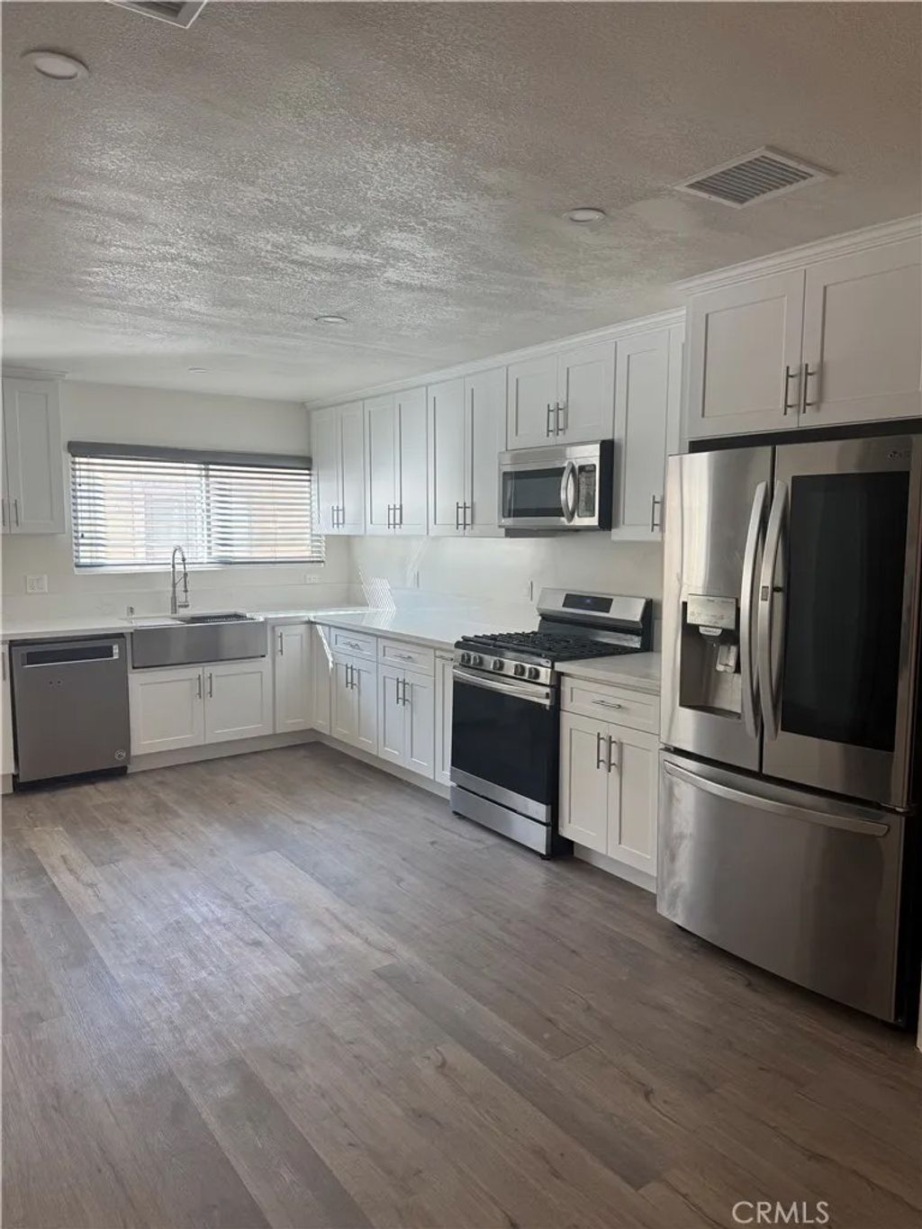 Photo of 10215 Variel Avenue #25, Chatsworth, CA 91311 (MLS # SR26079394)