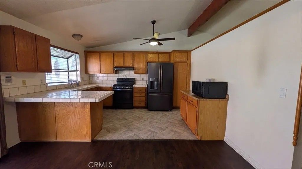 Photo of 4883 Newport Lane, Riverside, CA 92504 (MLS # IV26011288)