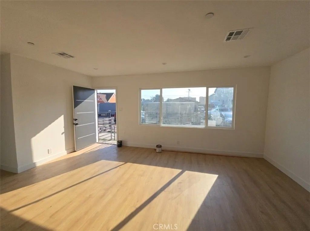 Photo of 1547 W 82nd Street, Los Angeles, CA 90047 (MLS # PW26026111)