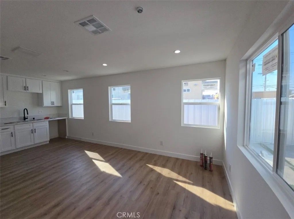 Photo of 1547 W 82nd Street, Los Angeles, CA 90047 (MLS # PW26026111)