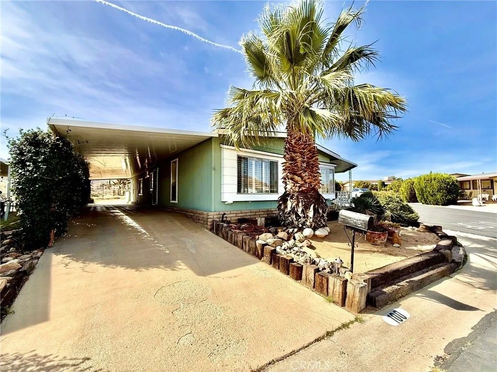 Photo of 7501 Palm Ave #100, Yucca Valley, CA 92284 (MLS # JT26065655)