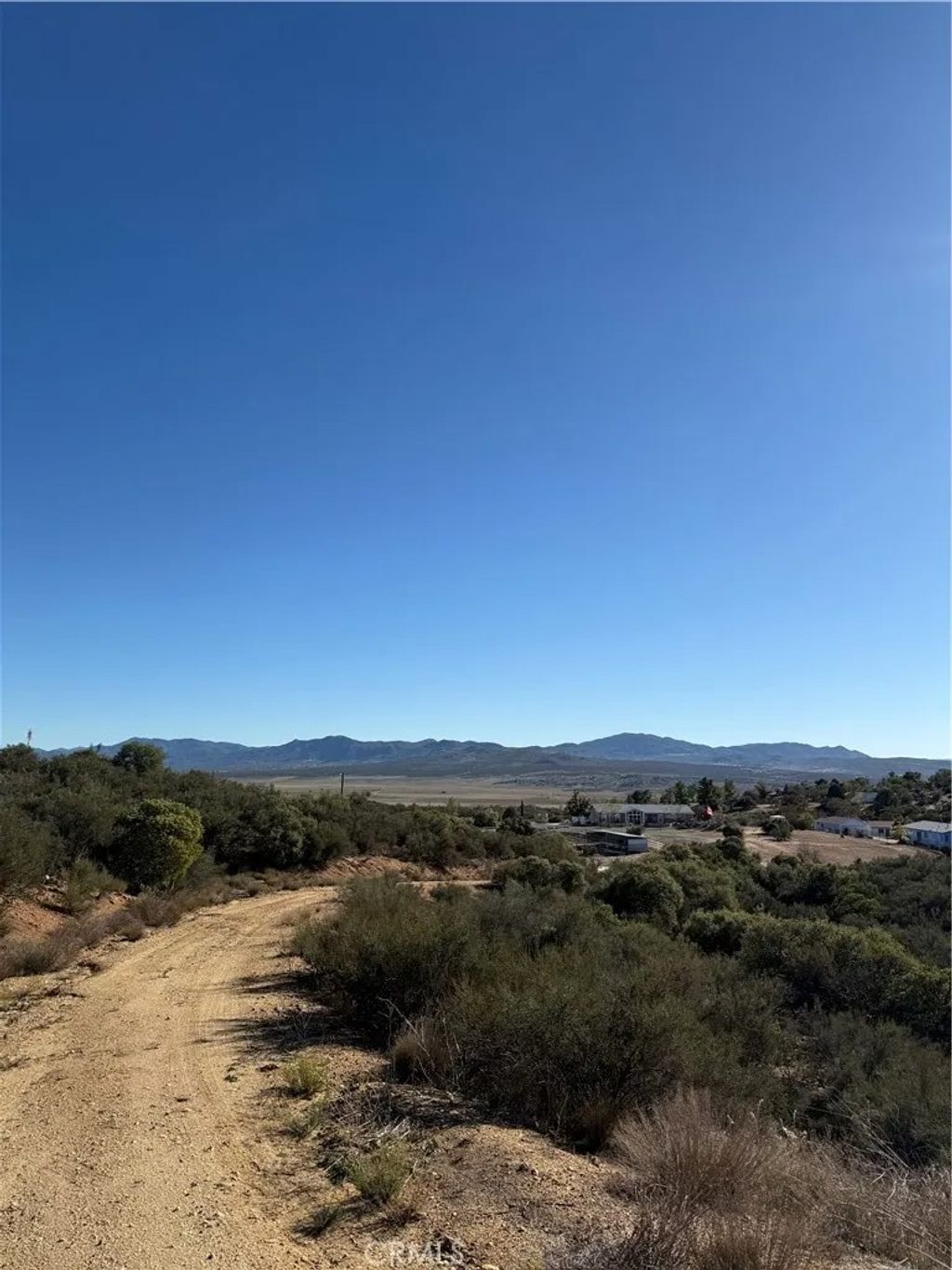 Photo of 56874 Engstrom Rd, Anza, CA 92539 (MLS # OC25274654)