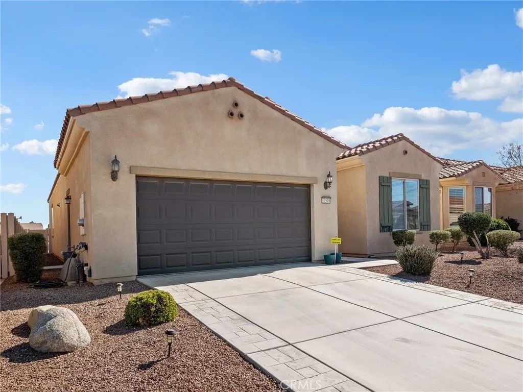 Photo of 10549 Green Valley Road, Apple Valley, CA 92308 (MLS # HD26033488)