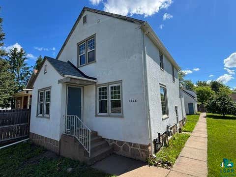 Photo of 1208 12th Ave E AVE, Hibbing, MN 55746 (MLS # 6126656)