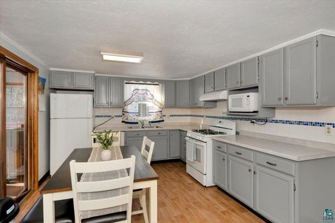 Tiny photo for 5980 Old Miller Trunk Hwy, Duluth, MN 55811 (MLS # 6123926)