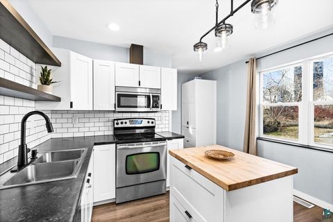 Tiny photo for 431 N 51st Ave W, Duluth, MN 55807 (MLS # 6124552)