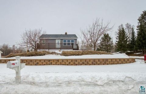Photo of 802 NW 3rd St, Chisholm, MN 55719 (MLS # 6123911)