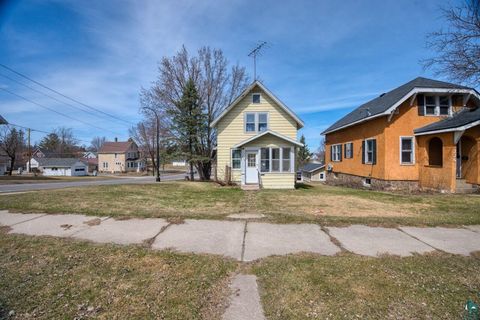 Photo of 230 2nd St NW, Chisholm, MN 55719 (MLS # 6124790)