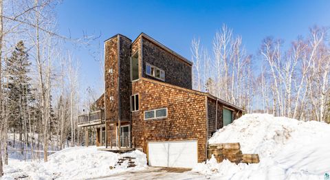 Photo of 67 Snowshoe Tr, Tofte, MN 55615 (MLS # 6124019)