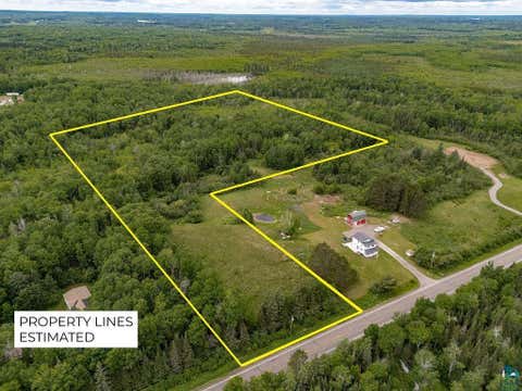 Photo of 57 Howard Gnesen Rd, Rice Lake, MN 55803 (MLS # 6126371)